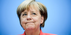 Angela Merkel kneift die Lippen aufeinander