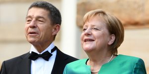 Die Köpfe von Angela Merkel und Joachim Sauer