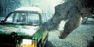 dinosaurier attakiert Auto