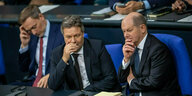 Christian Lindner, Robert Habeck und Olaf Scholz im Bundestag