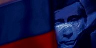 Putins Gesicht erscheint durch die russische Fahne