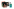 Zu sehen sind vier Ausgaben der taz FUTURZWEI sowie eine aufgeschlagene Ausgabe mit einem Foto von Güner Balci. Zudem die Aboprämie „Was wäre, wenn wir mutig sind?“ von Luisa Neubauer