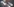 Eine Person bearbeitet mit einem Flammenwerfer eine Tempo 30-Aufschrift auf der Straße