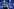 Älterer Herr mit grauen Haaren und bedröppelter Miene sitzt vor einer Wand, auf der Fifa steht
