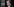 Viktor Orban steht mit nachdenklicher Miene vor einem Gebäude.