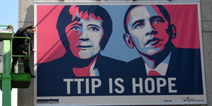 Plakat, das Barack Obama und Angela Merkel zeigt. Darunter die Worte: TTIP is hope