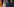 Merkel links, Donald Tusk links und ein unbekannter Mann von hinten