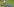Julian Draxler dribbelt an seinem grätschenden Gegenspieler vorbei
