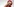 Ein blonde Barbie mit rotem Hut