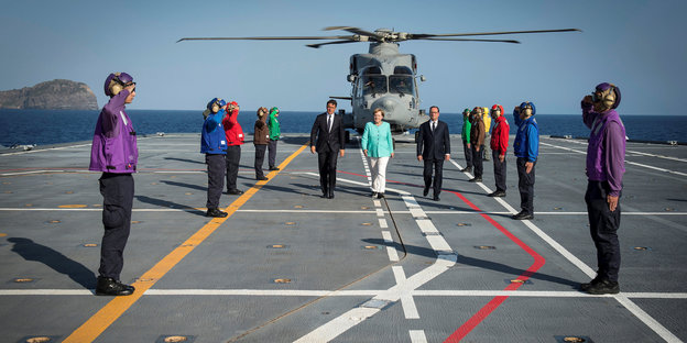 Renzi, Merkel und Hollande vor einem Hubschrauber