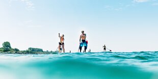 Stehpaddler im Wasser