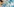 Eine blau-weiße Fahne, dahinter Seehofer und andere Politiker
