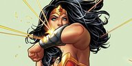 Wonder Woman hält schützend ihren Arm vor ihr Gesicht