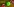 Zwei Beißzangen mit aufgeklebten Augen „essen“ einen grünen Apfel