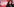 Andrea Nahles steht vor einer Wand mit einem DGB-Slogan