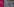 Ein Bildschirm zeigt irgendwelchen Random Computer-Code neben einem Telekom-Logo