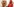 Ein Mann steht vor einer Karl-Marx-Figur