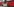 Auf dem Weihnachtsmarkt am Breitscheidplatz installieren zwei Bauarbeiter Betonsperren