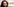 Aslı Erdoğan mit einem Kopfmikrofon, daneben das Logo von „Arte“