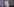 Edward Snowden guckt als Projektion von einer Leinwand ins Publikum