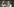 Der Anführer der Alt-Right-Bewegung mit einer erhobenen Hand und einem Mikrofon in der anderen