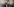 Die Schauspielerin Maggie Gyllenhaal steht vor einer Wand, an der mehrfach "National Board of Review" steht