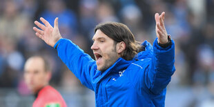 Torsten Frings schreit mit ausgebreiteten Armen