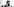 Joseph Beuys in Weste und mit typischem Hut hält sich süffisant die Hand ans rechte Ohr