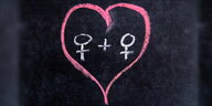 Ein Herz mit zwei Frauenzeichen