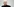 Anton Schlecker steht vor einer Wand
