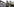 Soldat in Fleckentarn-Uniform mit Sturmgewehr