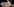 Auf einer Hand liegt ein Foto von einem Mann