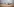 ein Tornado-Kampfflugzeug auf einer Startbahn, im HIntergrund eine Stadt