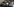 ein Bagger lädt Kohle auf einen Lastwagen