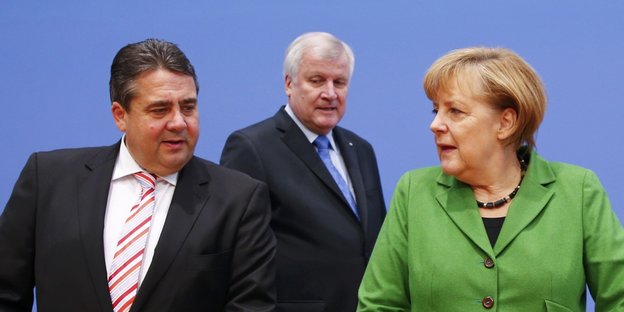 Sigmar Gabriel, Horst Seehofer und Angela Merkel stehen nebeneinander