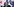 Emmanuel Macron steht vor der französischen und der europäischen Flagge