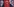Drei Banner hängen nebeneinander, auf einem ist der türkische Staatsgründer Atatürk zu sehen, auf einem Erdogan, in der Mitte die türkische Flagge