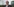 Wolfgang Kubicki steht auf einer Wiese vor dem Gebäude des Landtags in Schleswig-Holstein