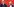 Zwei Männer mit Glatzen und Brillen stehen nebeneinander und gucken beide voneinander weg