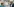Angela Merkel und Dieter Zetsche schauen sich an