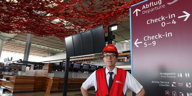 Flughafenchef im Terminal