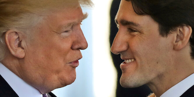 Donald Trump und Prime Minister Justin Trudeau sprechne miteinander