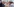 Angela Merkel und Horst Seehofer sitzen sich an einem Biertisch gegenüber und blicken grimmig