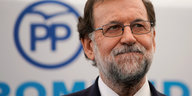 Ministerpräsident Rajoy macht einen verlegenen Gesichtsausdruck