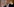Martin Schulz hebt beide Hände in die Höhe - mit offenen Handflächen nach vorne