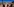 Menschen in einer verwüsteten Landschaft