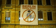 Anti-Nazi-Plakat an Hauswand