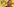 BVB-Chef Hans-Joachim Watzke vor Vereinslogo