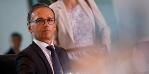 Mann in Anzug mit Brille - Justizminister Heiko Maas