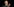 Jürgen Trittin sitzt vor schwarzem Hintergrund und weist mit dem rechten Arm nach links